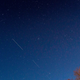 The US satellite SpaceX Starlink 5 is seen in the night passing in the sky above Svendborg on South Funen, Denmark, on April 21, 2020.